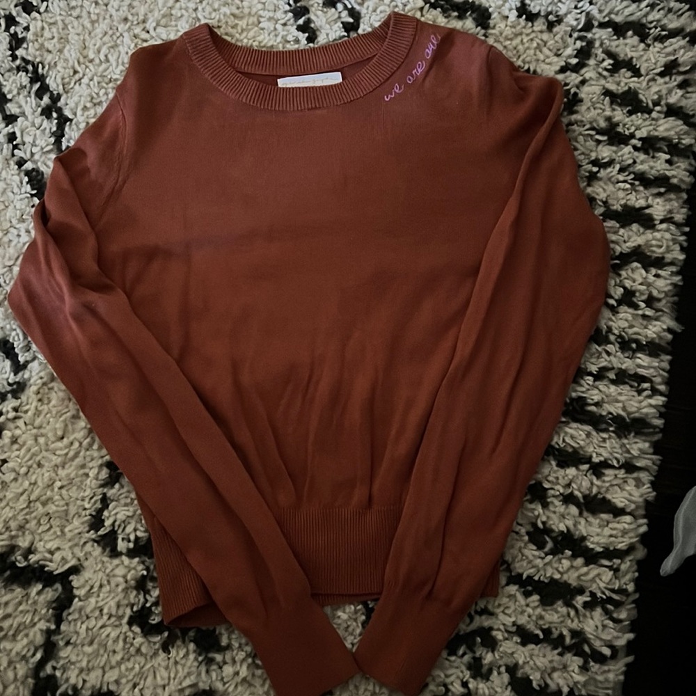 Spiritual gangster mauve like color sweater. Thin. Size small. Worn once